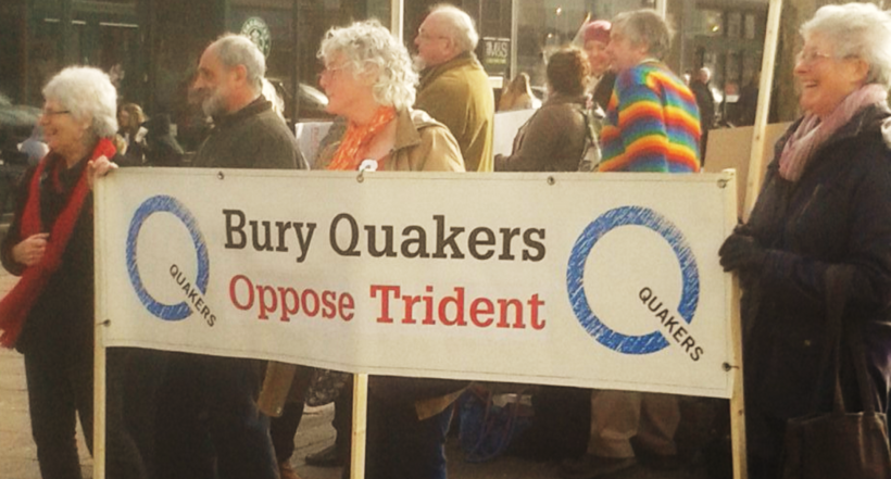 Quakers holding the "Bury Quakers oppose Trident" banner during their silent vigil. Phot credit: Jill Segger