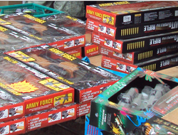 Stacks of toy assault rifles in boxes on sale