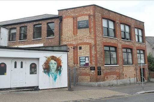 Former printing works converted for Quaker use with a high ceiling building.