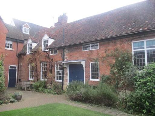 Built in 1695 meeting house remains of a medieval or post medieval well.