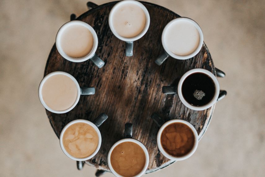 Circle of coffee mugs in different shades