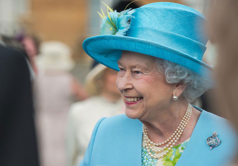 Elderly lady in blue hat