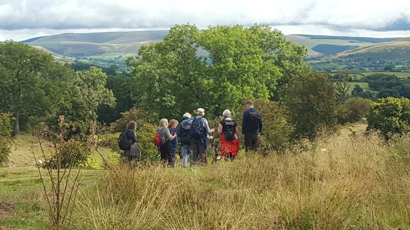 walkers in the hills