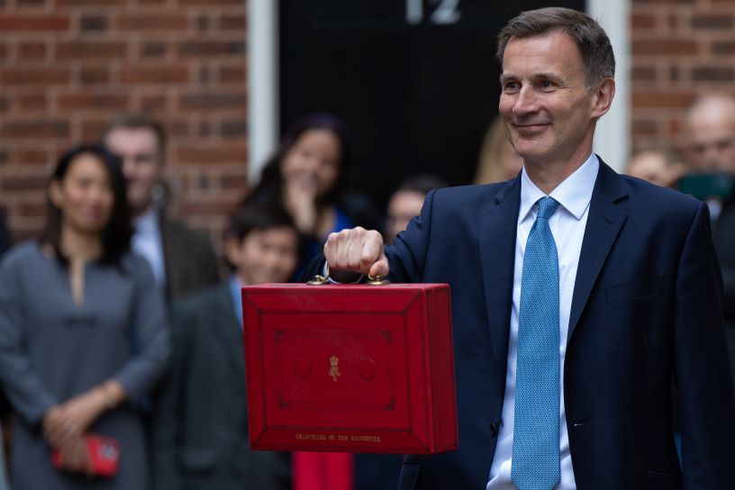 Man holding red briefcase