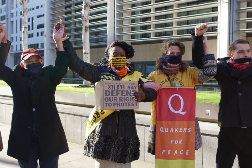 Protestors holding raised hands