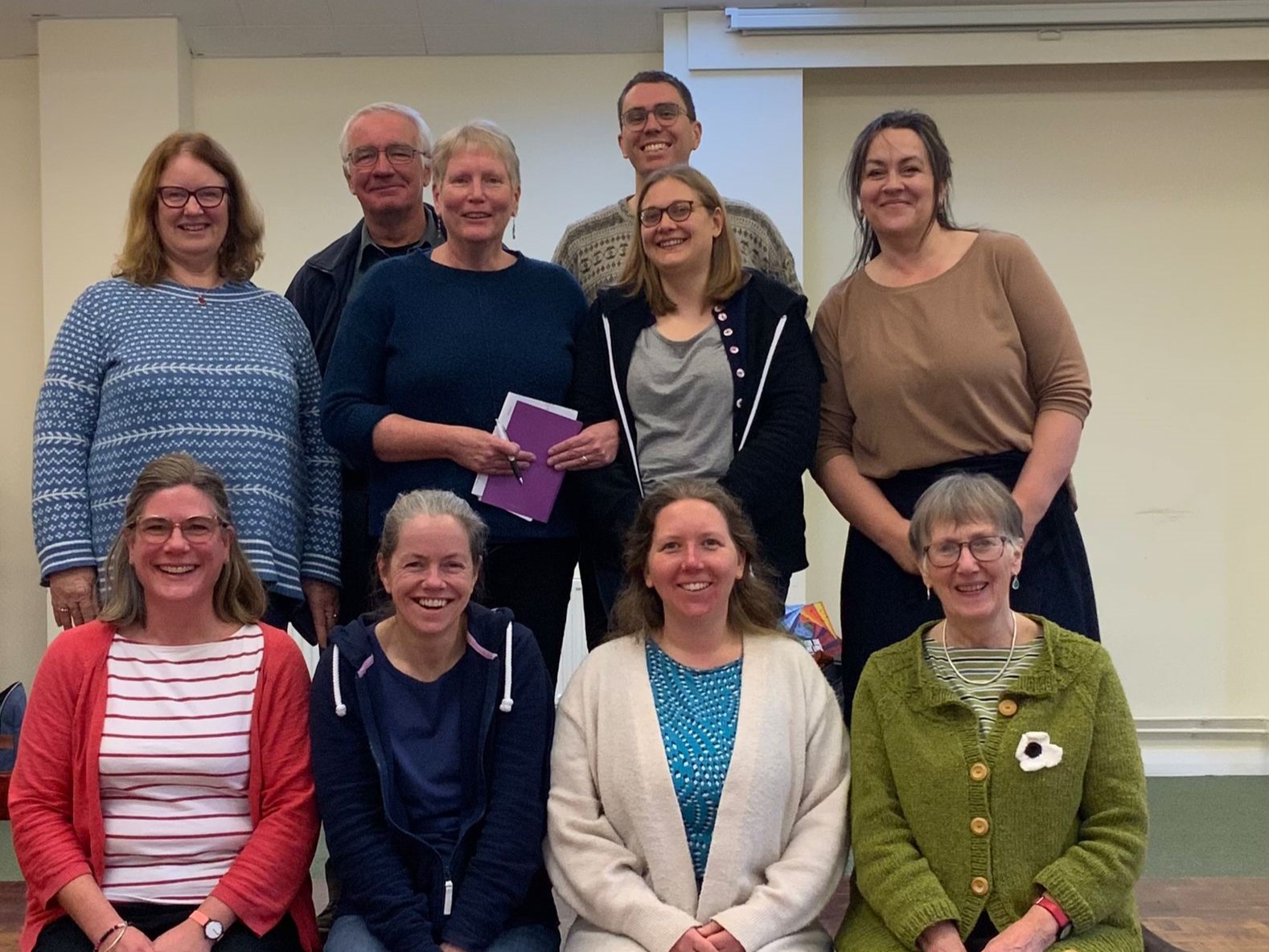 Group of people, the CYP trainers standing for a posed photo