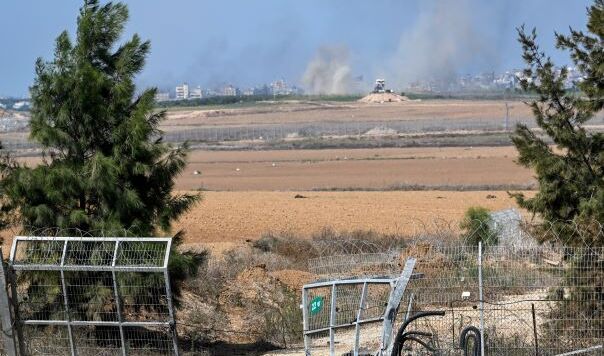 smoke rising over dry fields