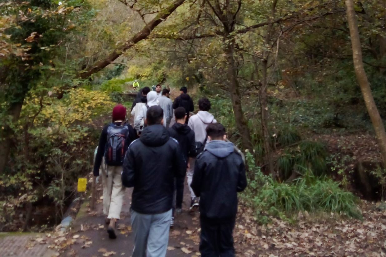 group of teenagers on river walk