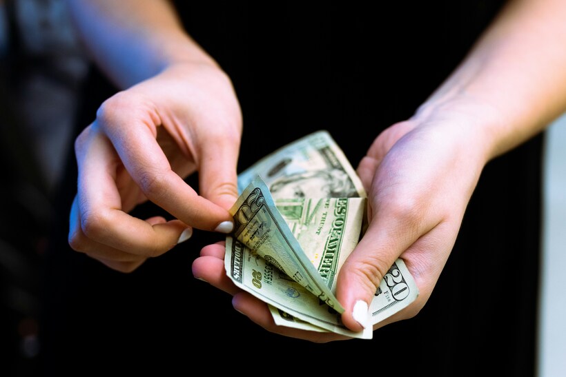 Tax can be one part of achieving a just peace. Photo by <a href="https://unsplash.com/@igalness?utm_source=unsplash&utm_medium=referral&utm_content=creditCopyText">Igal Ness</a> on <a href="https://unsplash.com/photos/person-holding-fan-of-100-us-dollar-bill-9wY2ofzQ9Us?utm_source=unsplash&utm_medium=referral&utm_content=creditCopyText">Unsplash</a>