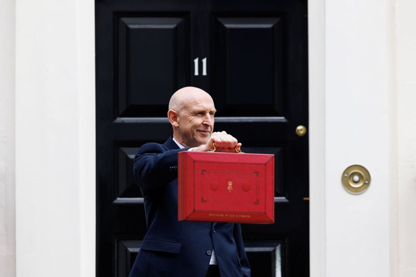 Man holding red briefcase